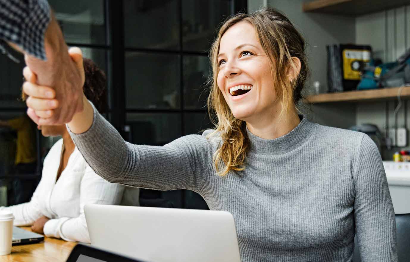 Investment Planning Handshake - Mercer Advisors