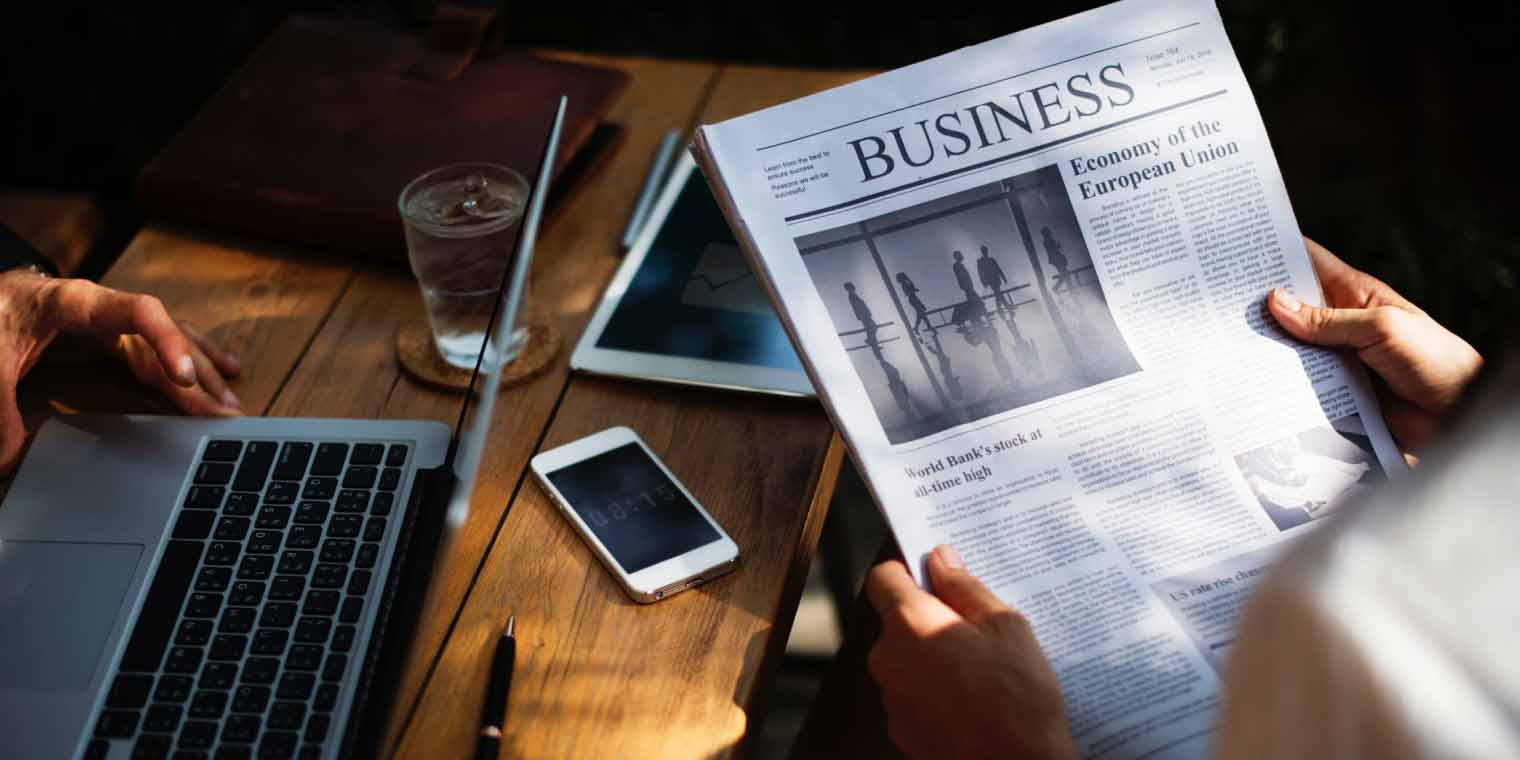 Reading newspaper