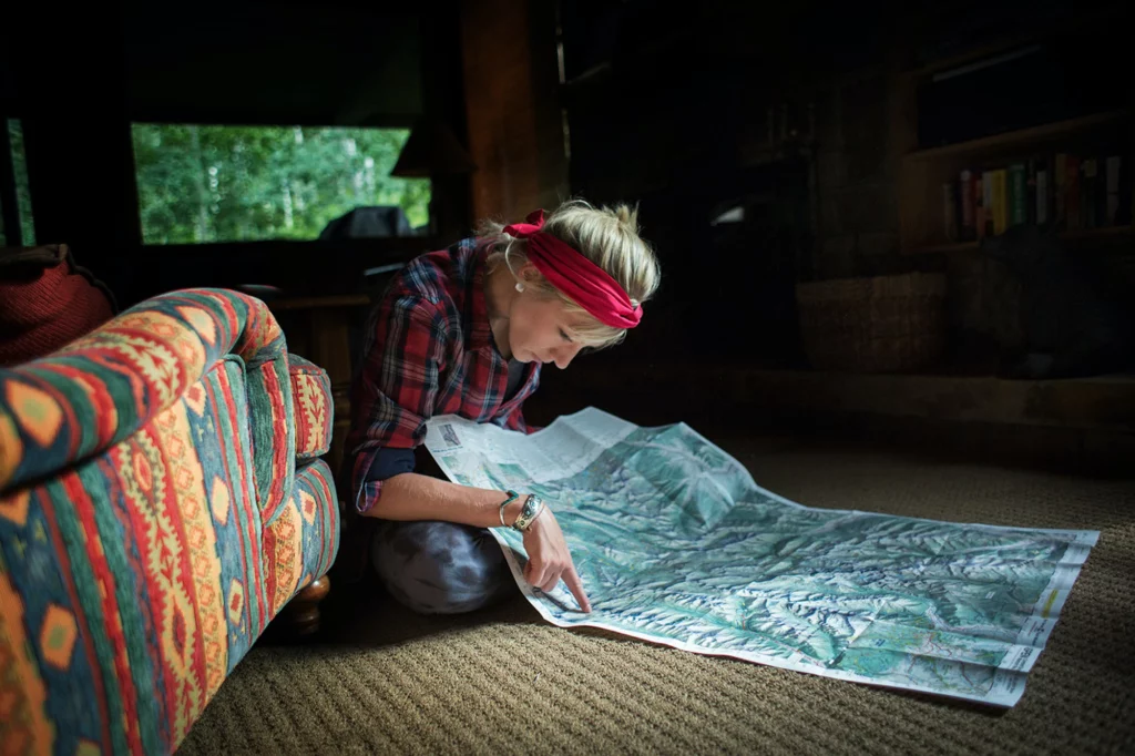 Woman looking at map