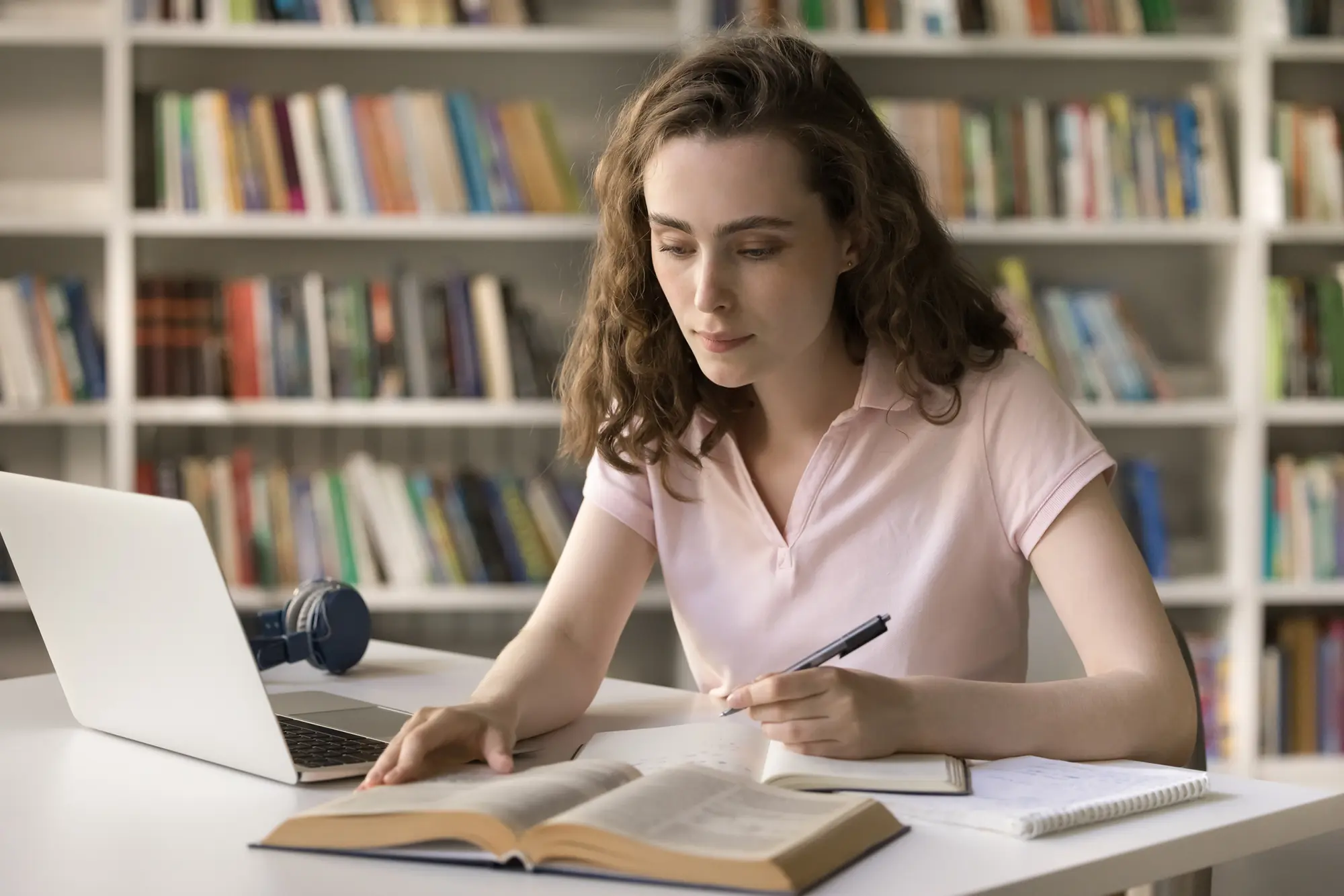 Young woman looking at paperwork