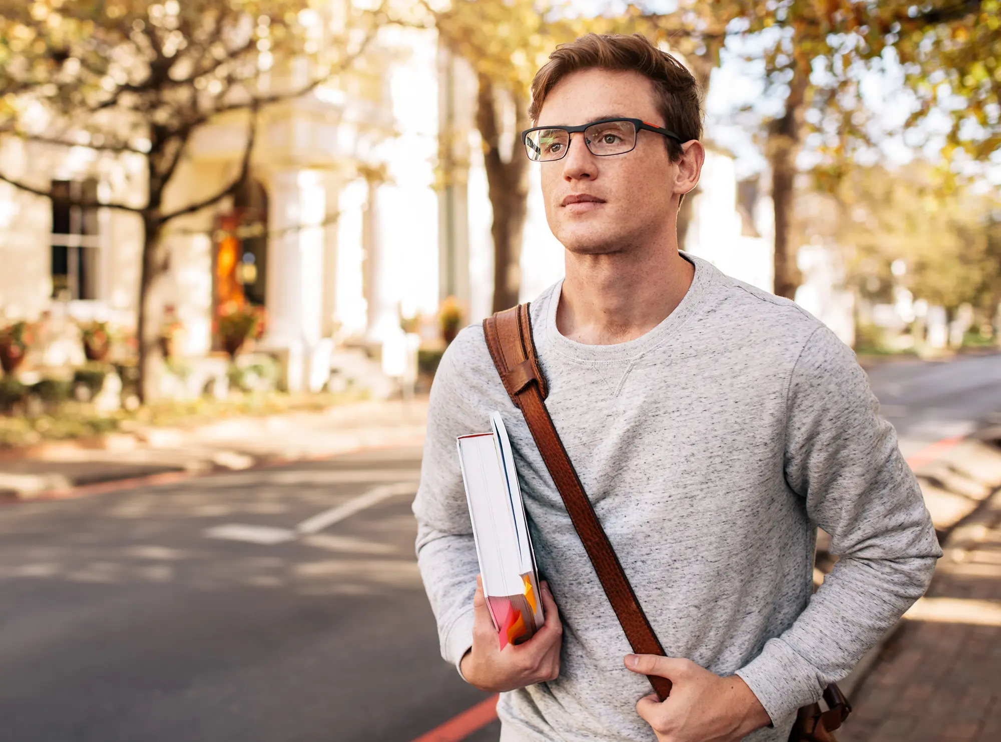 You man walking down the street.