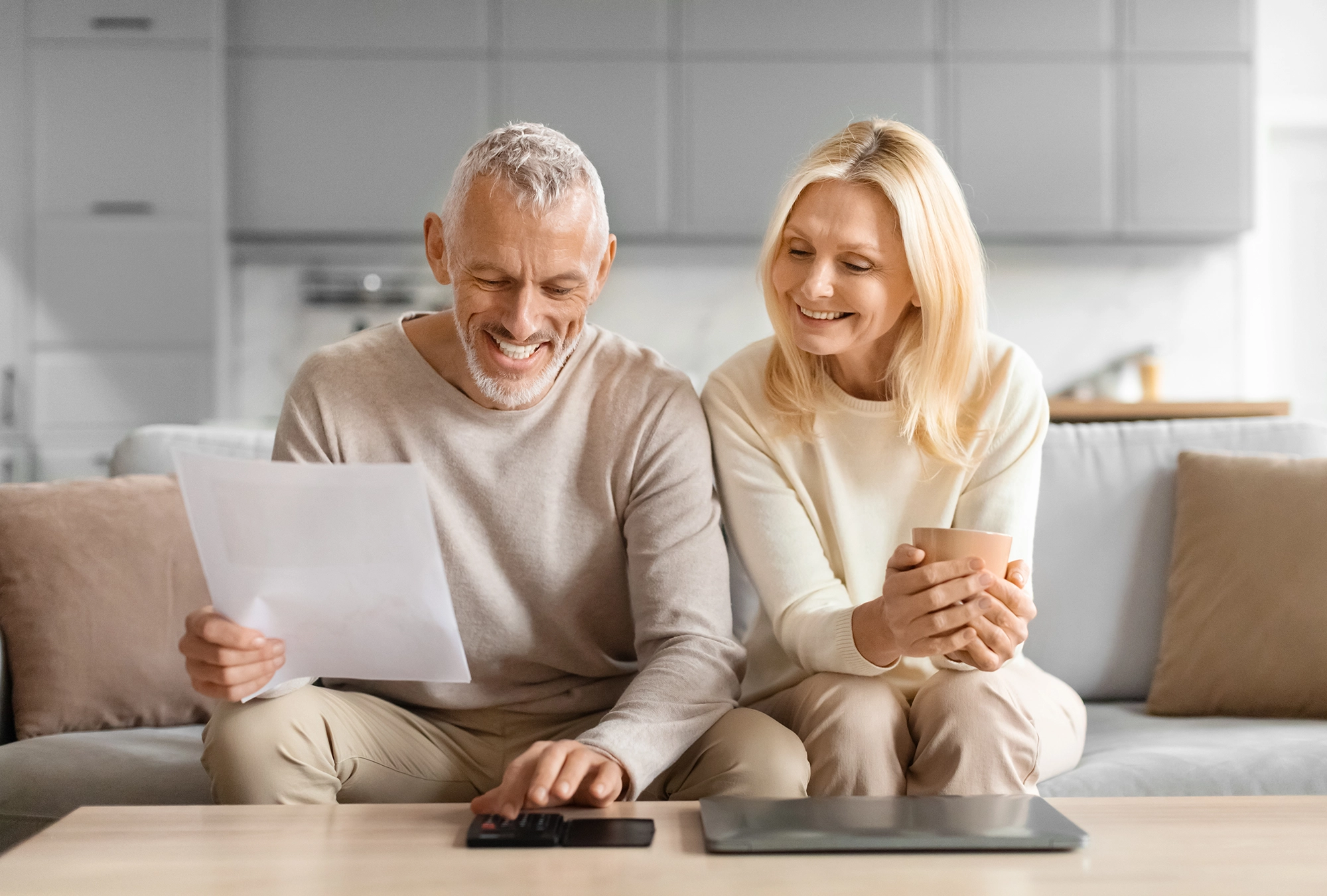 A man and woman reviewing early retirement healthcare