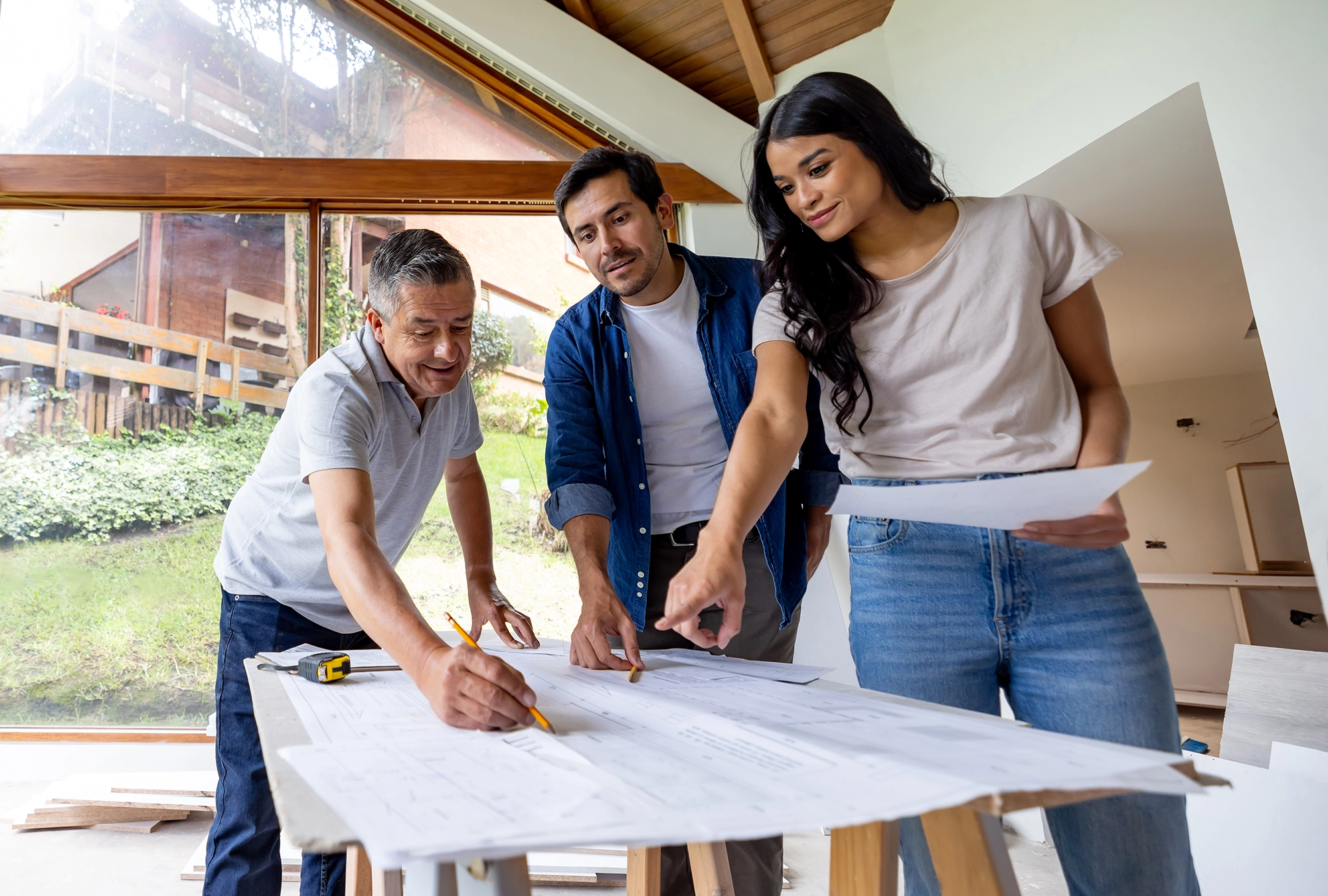 A family working on home renovation using maximized returns