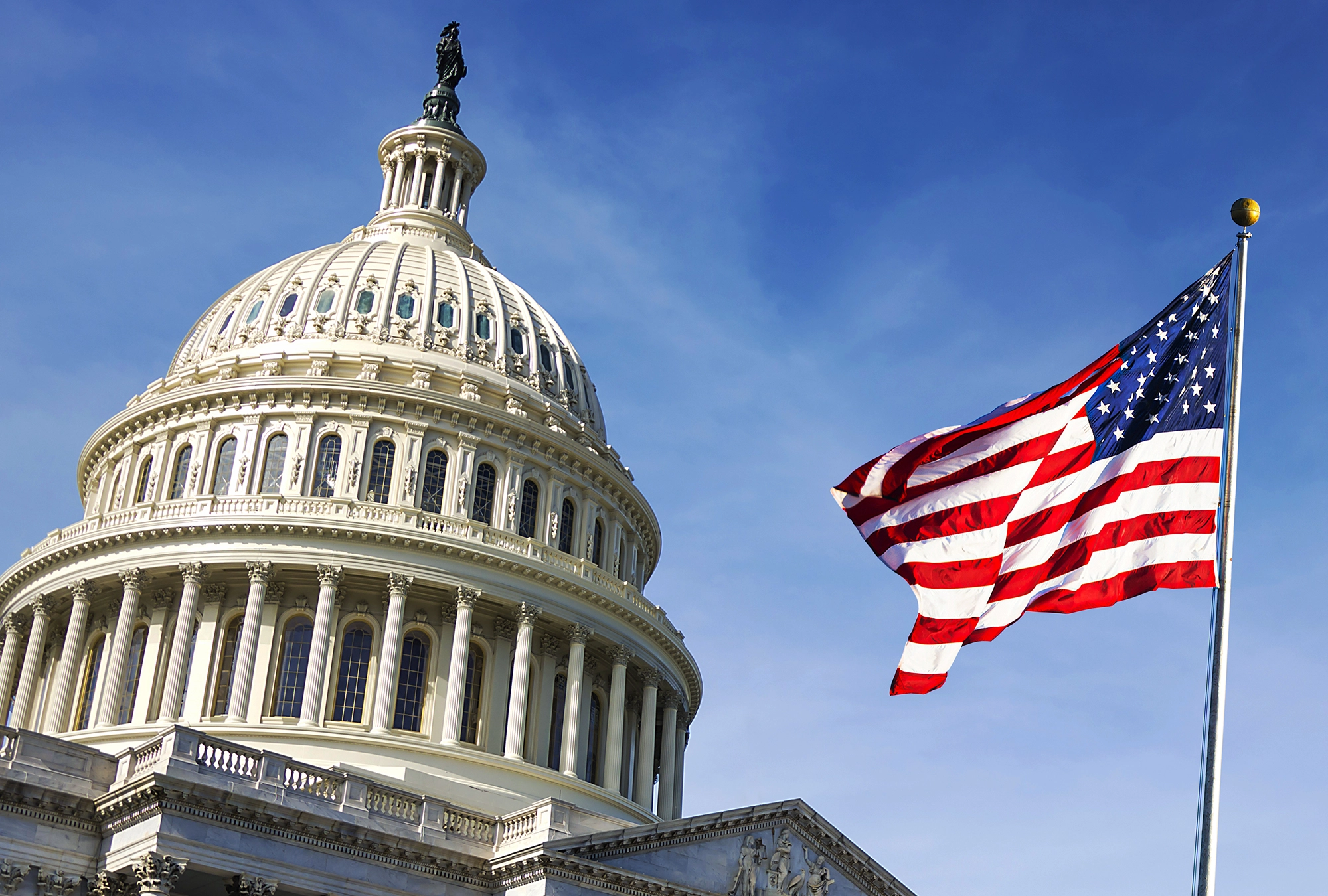 American flag and Capital building