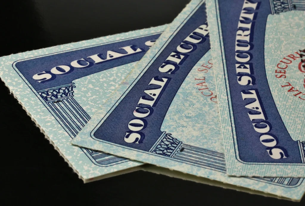 closeup image of social security cards stacks and fanned out