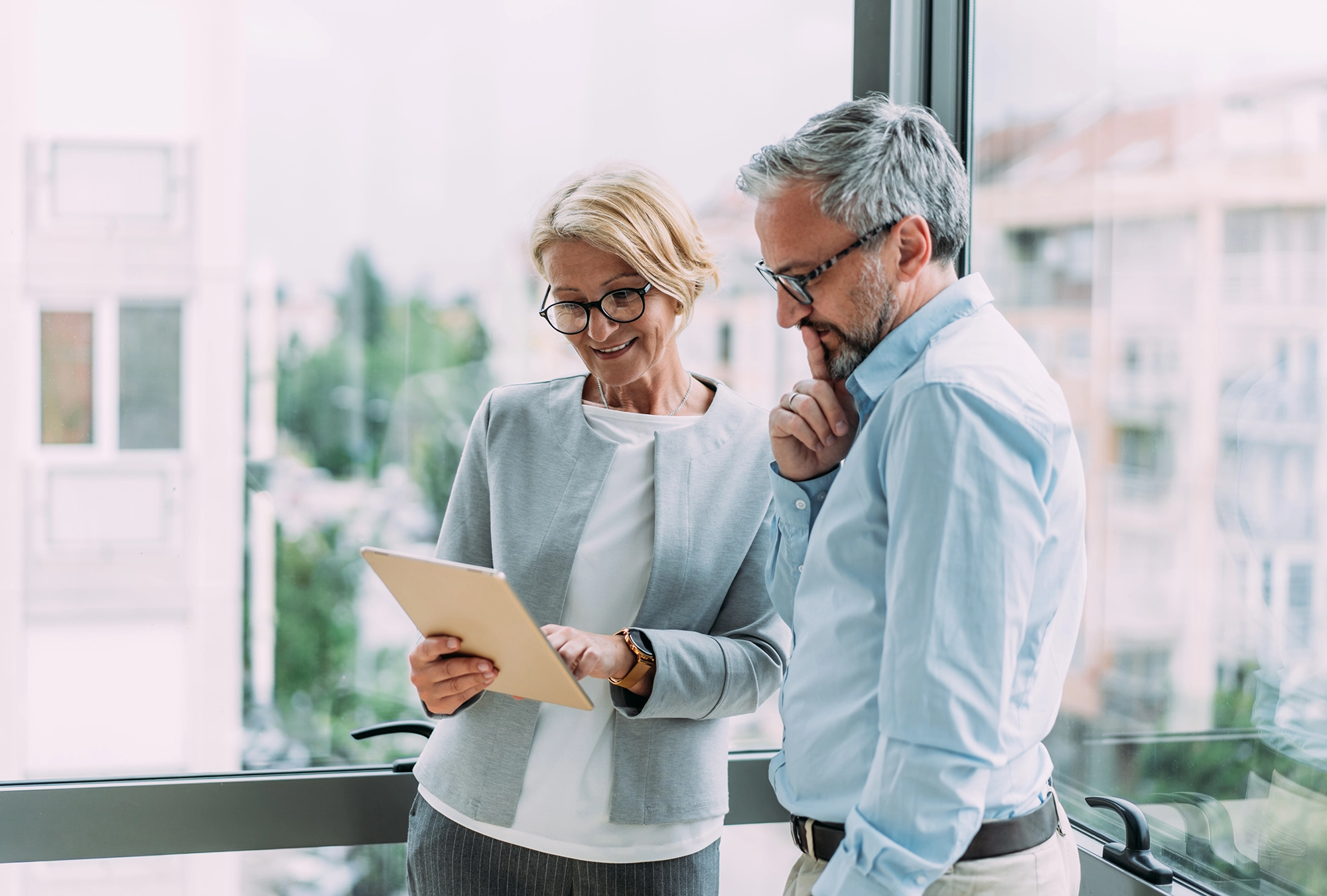Two professors reviewing pension plans