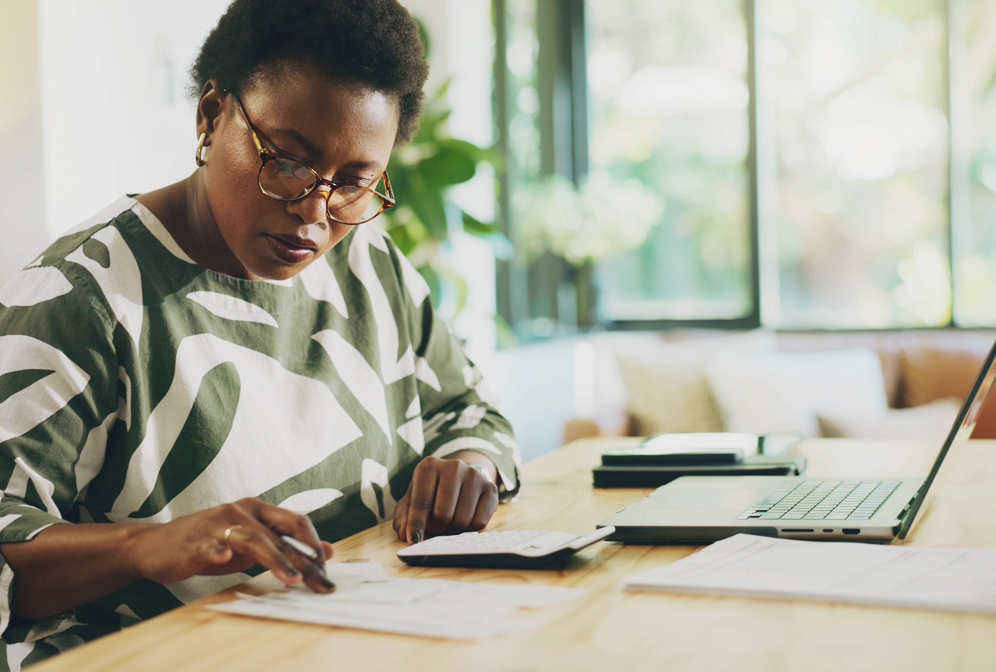 A woman reviewing premium tax credits