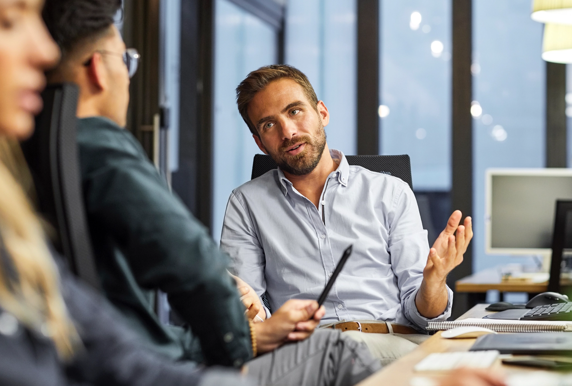 Coworkers talking about workplace benefits