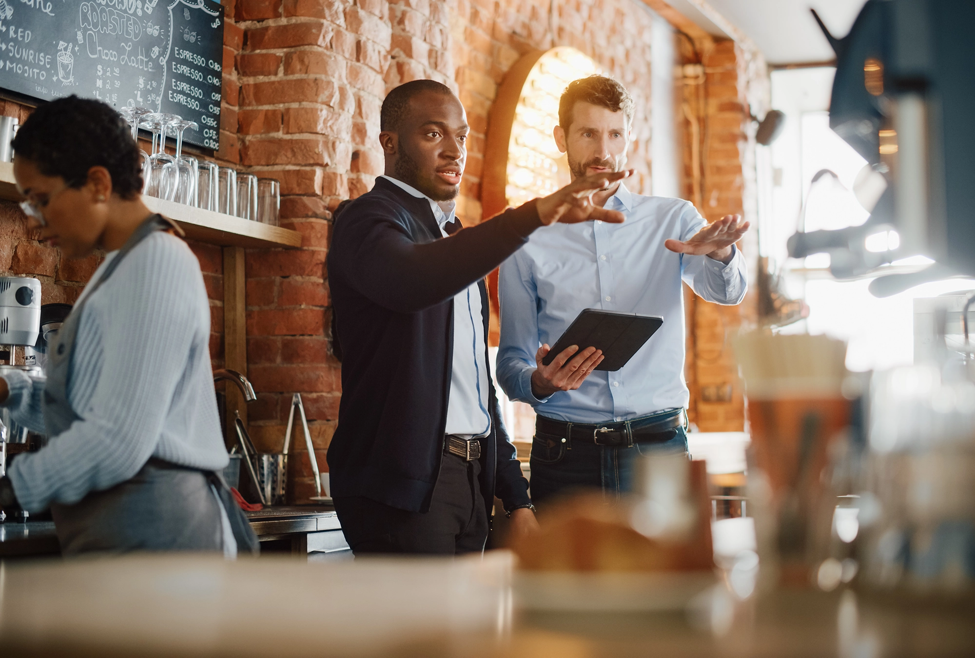 Two business owners talking about a business sale