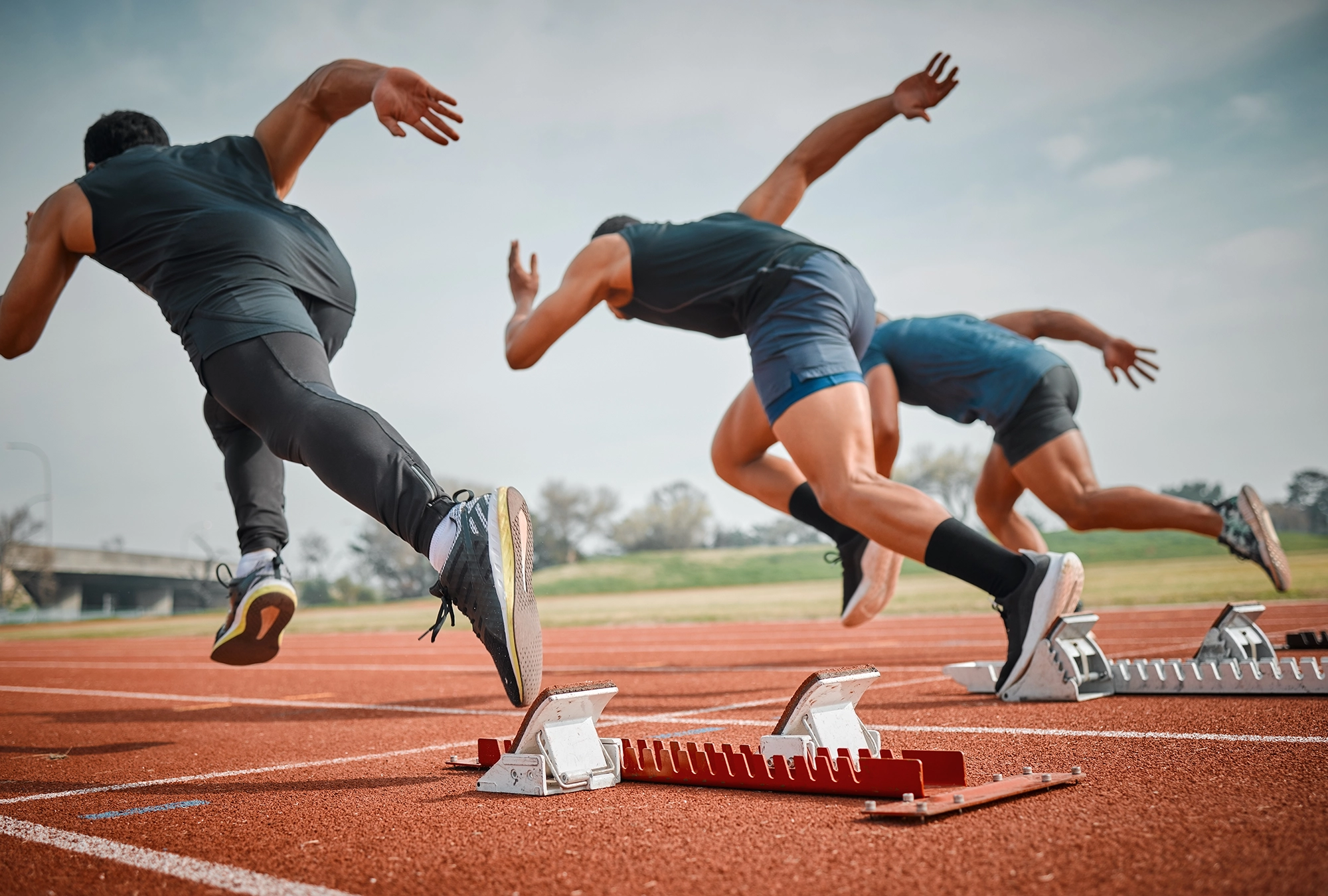 Athletes running on a track