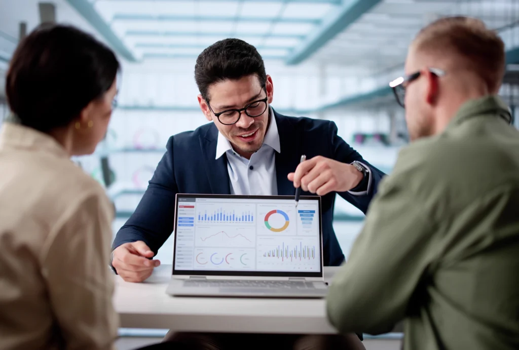 A couple talking through their portfolio with an advisor