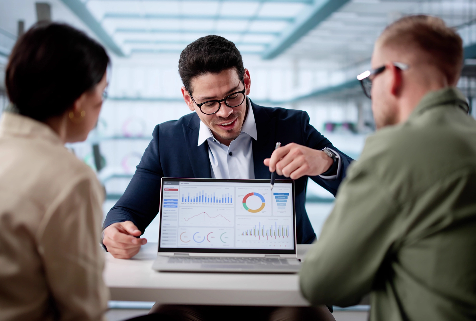 A couple talking through their portfolio with an advisor