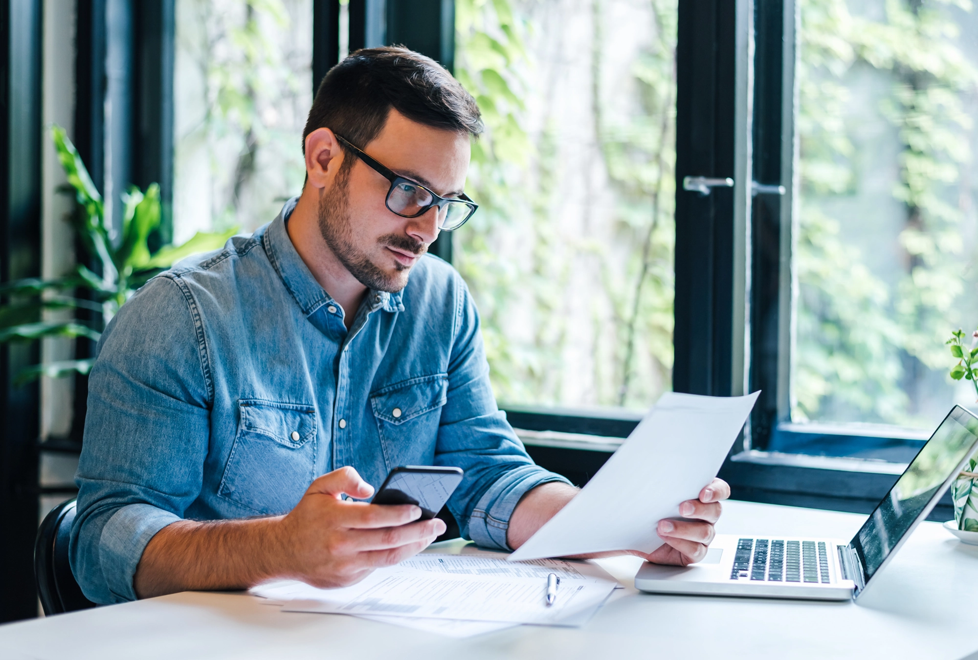 A man working on his taxes