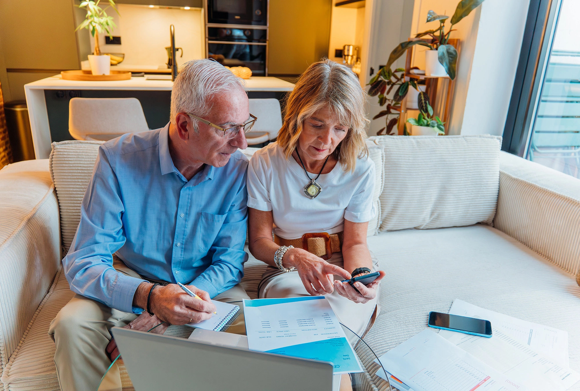 A couple reviewing spending in retirement
