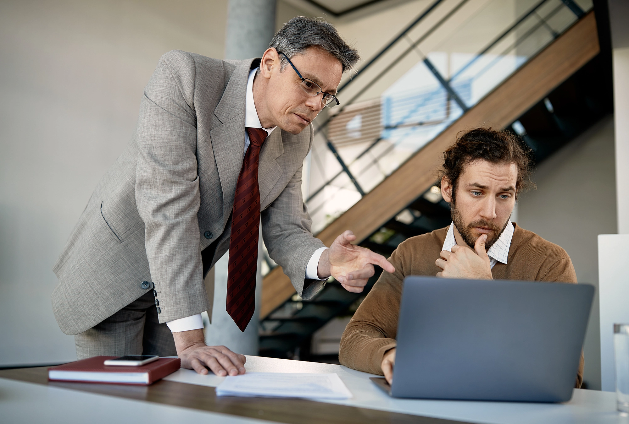 An advisor giving mentorship to another individual