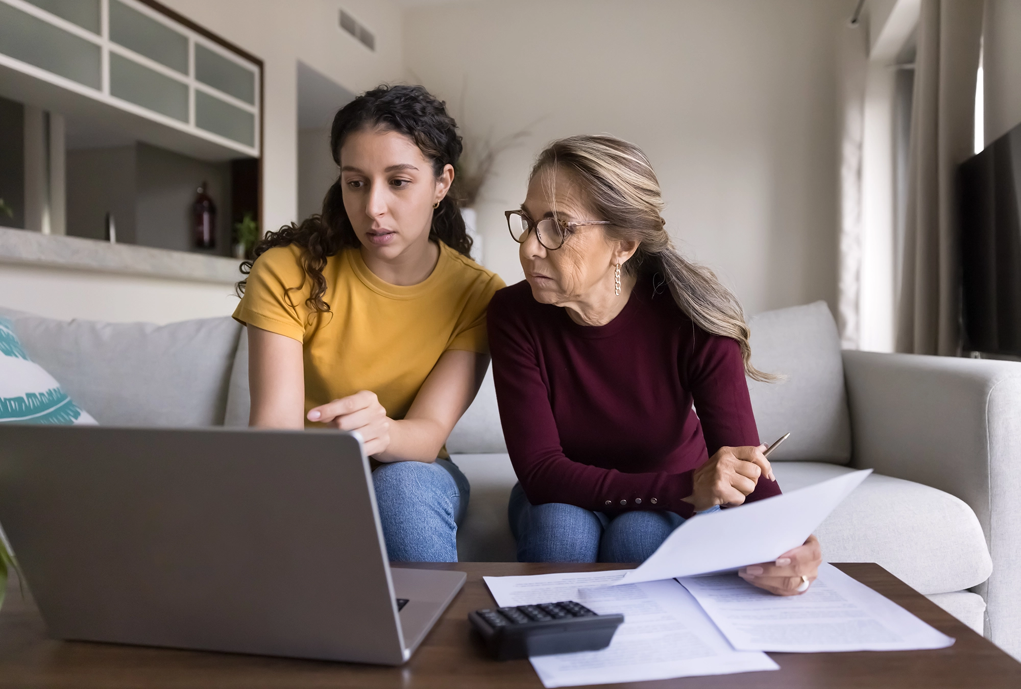 A parent and their student looking at loans