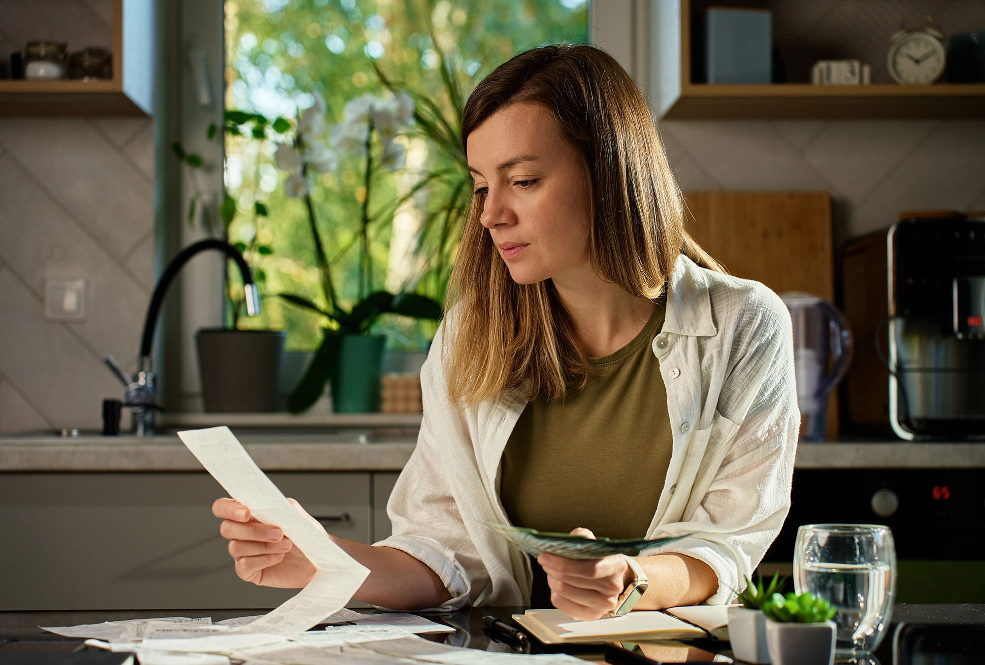A woman working on the family financial plan