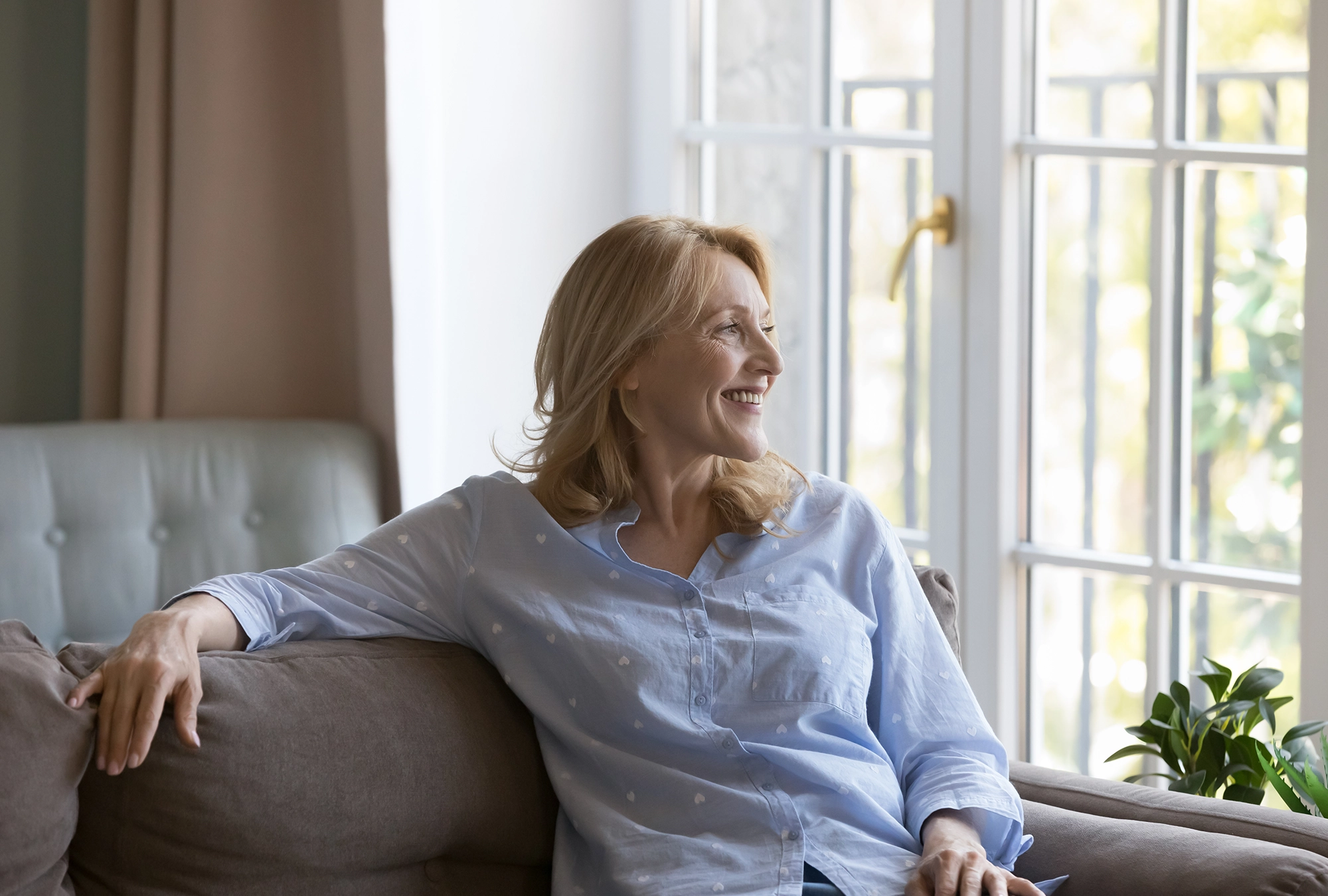 A woman looking out a window