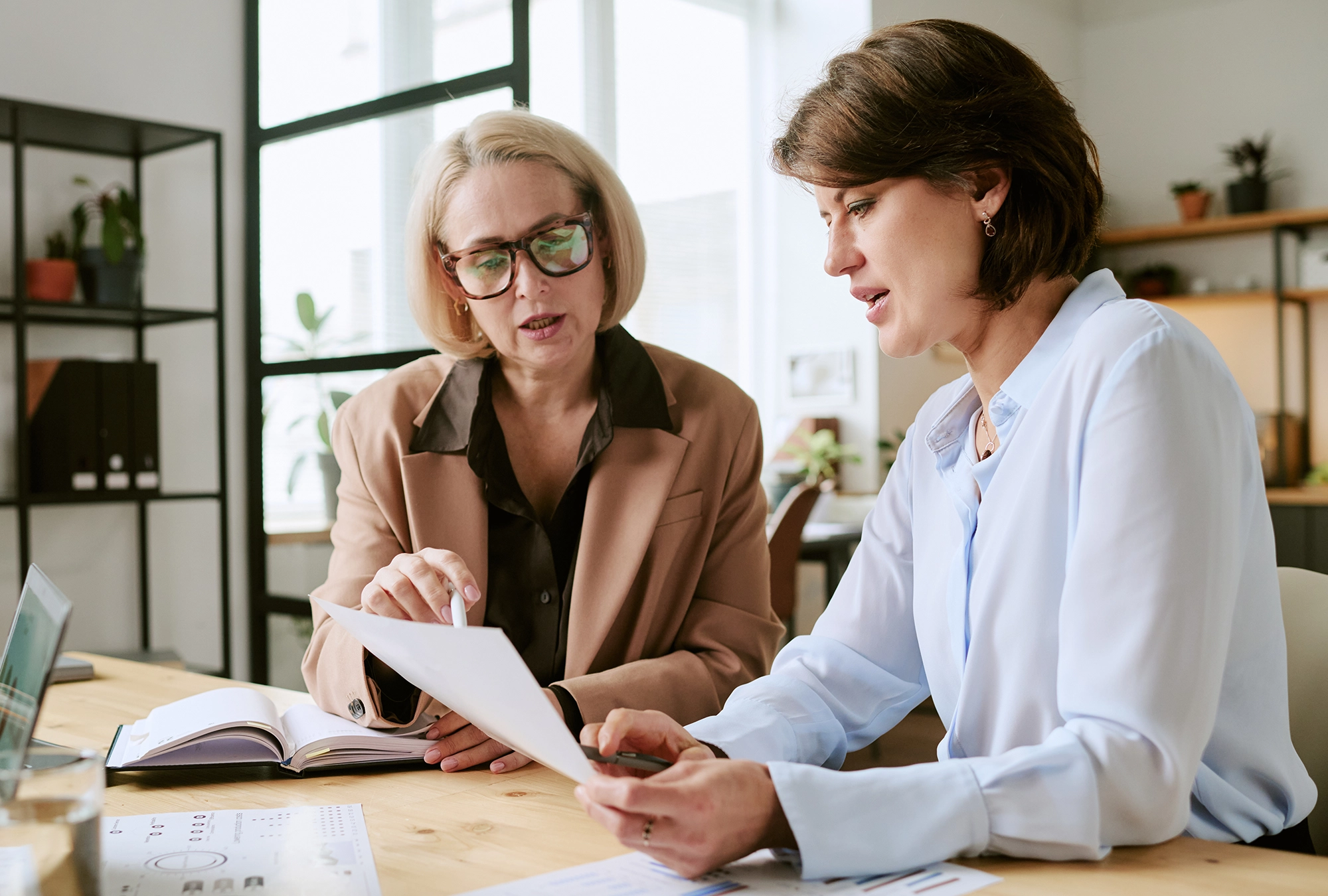 Two woman business owners planning