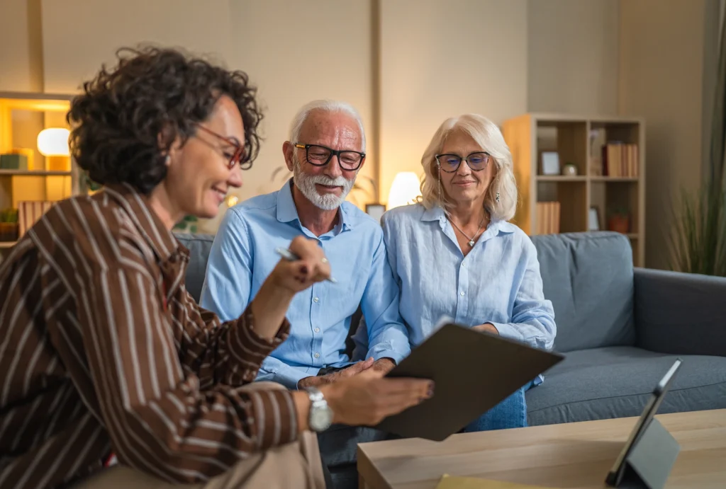 Older couple meeting with advisor.