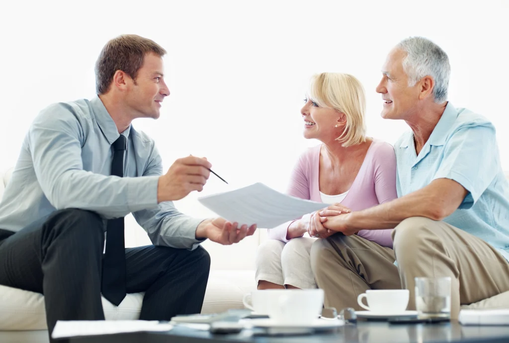 Couple talking to advisor